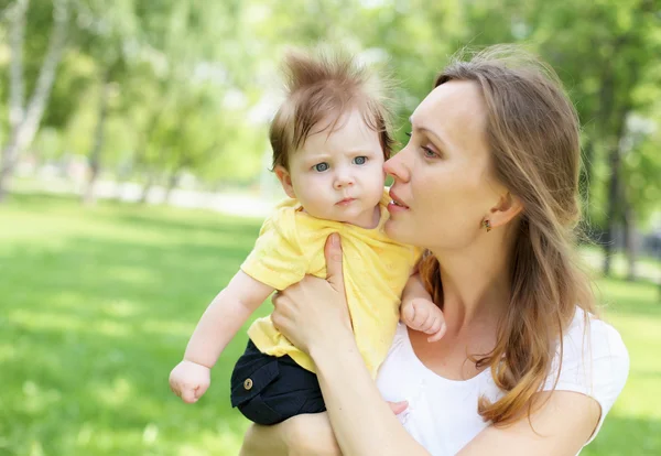 Portrait of mother holding her little baby — Stock Photo, Image