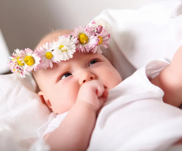 Portrait of a baby with a wreath — Stock Photo, Image