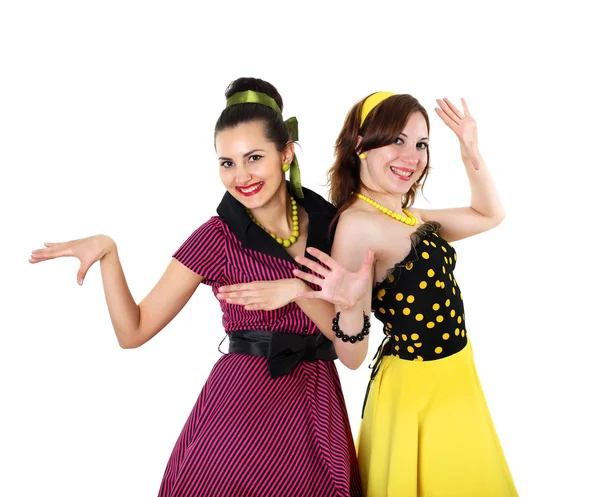 Two young woman in bright colour dresses — Stock Photo, Image