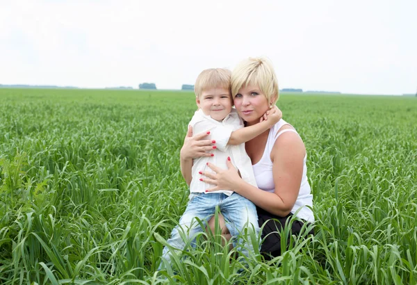 Portrait of mother with her son outdoors — Stock Photo, Image