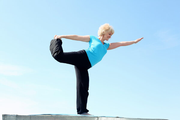 Portrait of a senior woman doing yoga
