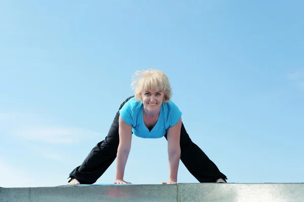 stock image Portrait of a senior woman doing yoga