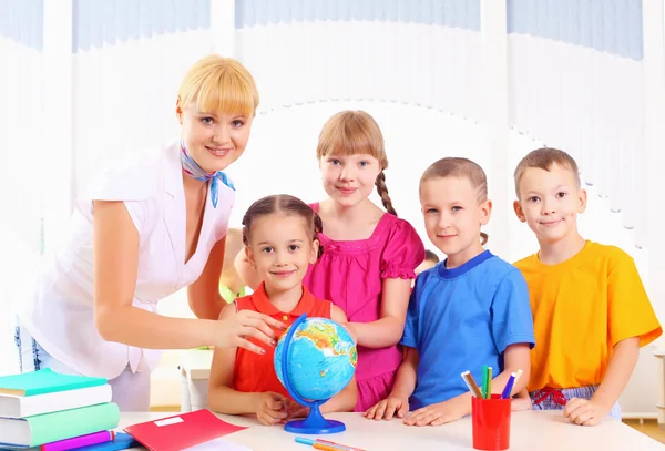 Teacher and his students — Stock Photo, Image
