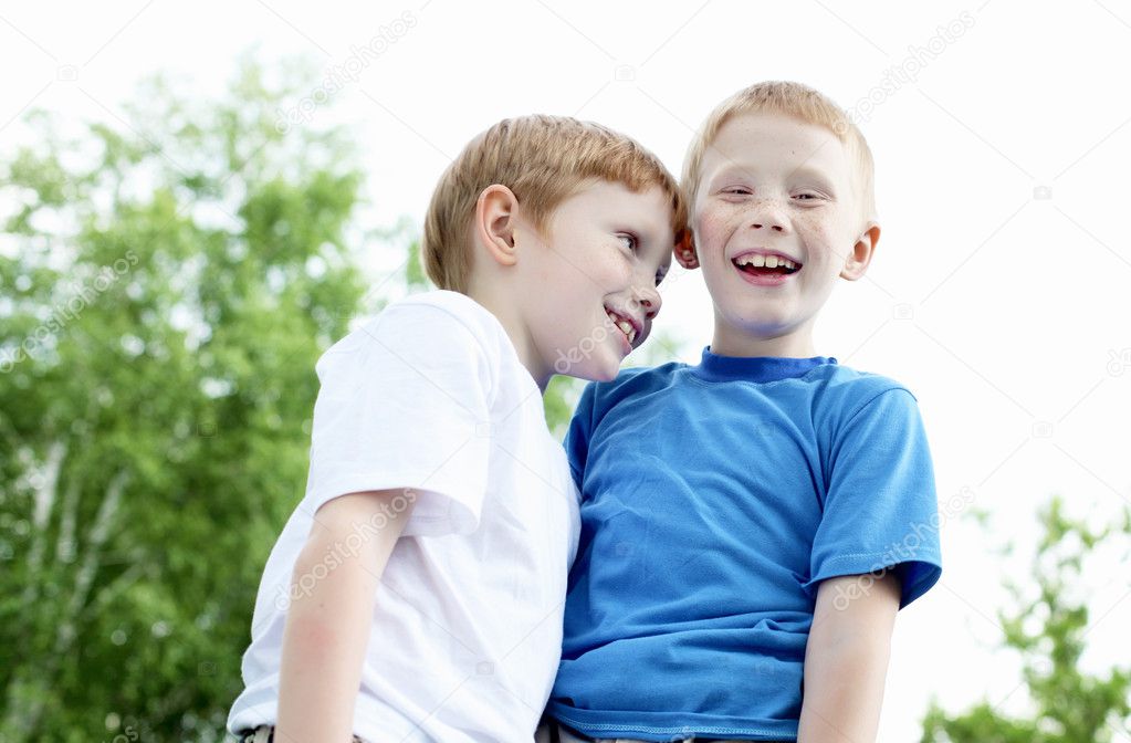 Portrait of two boys in the summer outdoors