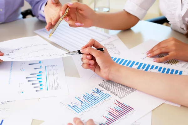 Financial and business documents on the table Stock Image