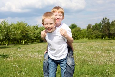 Two brothers outdoors clipart