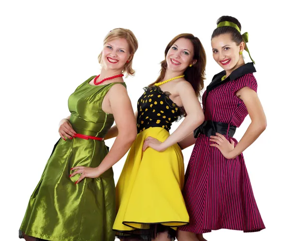 Τρεις νεαρή γυναίκα στο φωτεινό χρώμα φορέματα — Φωτογραφία Αρχείου