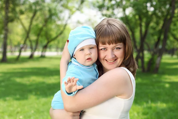 Mother with her baby boy outside — Stock Photo, Image