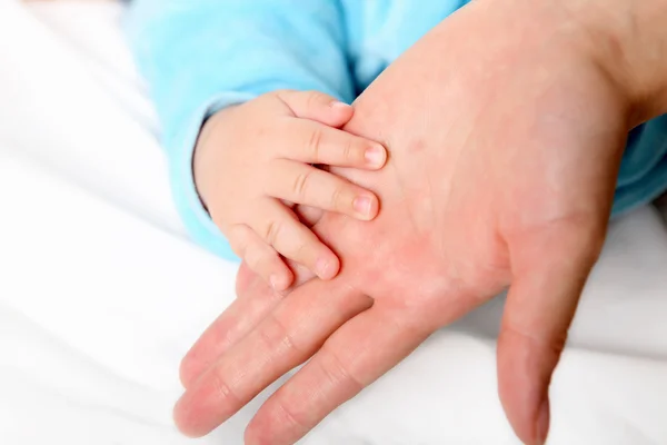 stock image Mother holding her child's hand