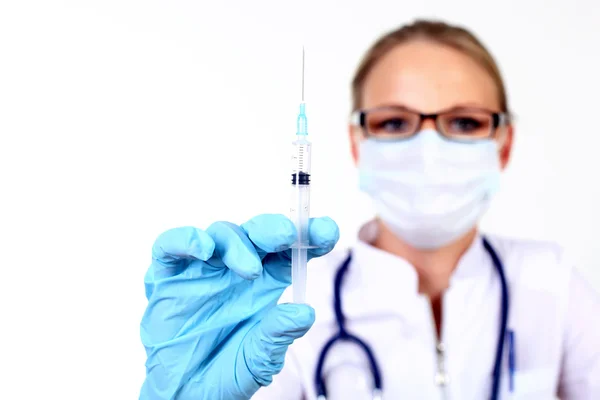 Young female doctor with syringe — Stock Photo, Image