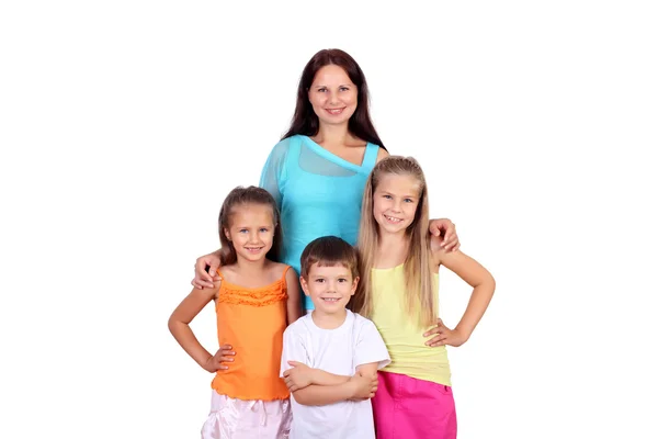 Мать с тремя детьми в студии — стоковое фото