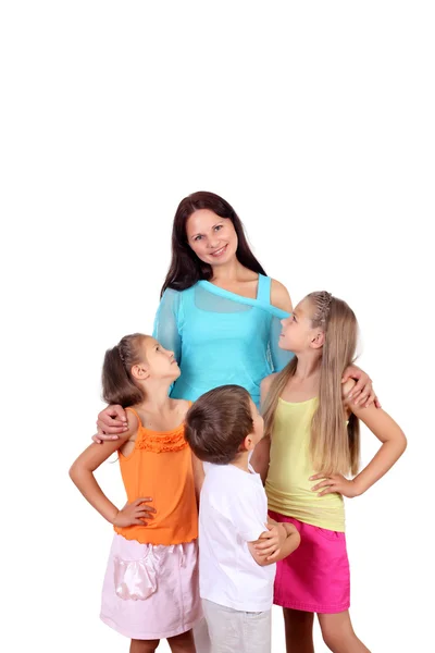 Mãe com seus três filhos no estúdio — Fotografia de Stock
