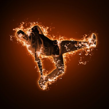 Fire dancer against black background clipart