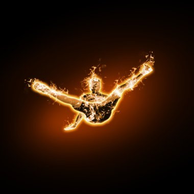 Fire dancer against black background clipart