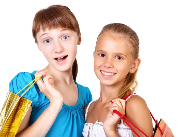Velmi mladé dívky s nákupní tašky — Stock fotografie