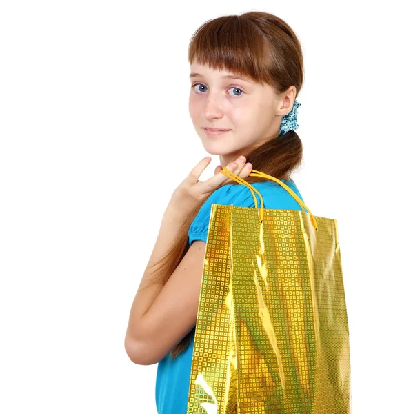 Docela dospívající dívka s nákupní tašky — Stock fotografie