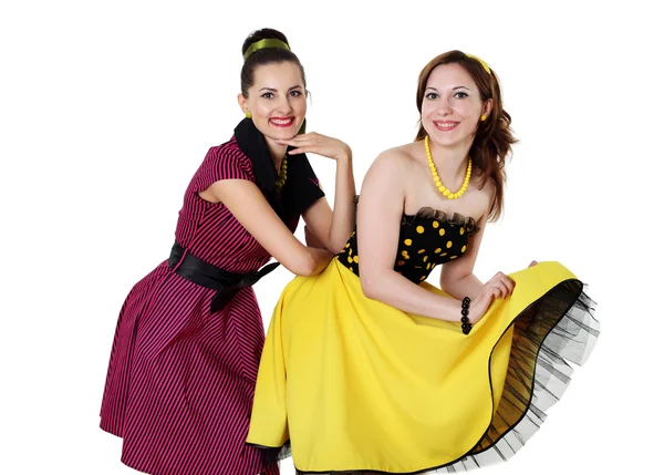 Twee jonge vrouw in felle kleur jurken — Stockfoto
