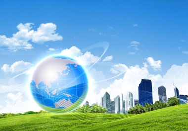 Green planet against blue sky and clean nature clipart