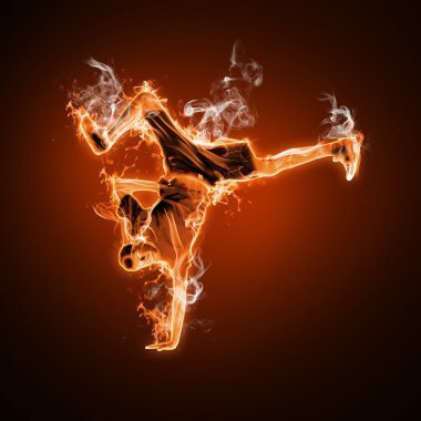 Fire dancer against black background clipart