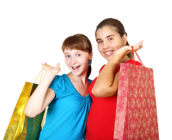 Meninas adolescentes bonitas com sacos de compras — Fotografia de Stock