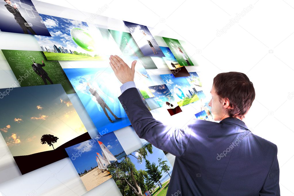 Man working with vurtial screens