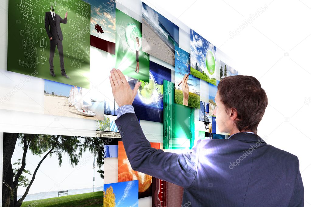 Man working with vurtial screens
