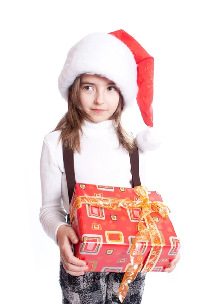 Little girl with santa's hat and gift holding — Stock Photo, Image