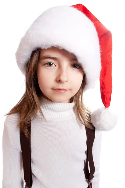 圣诞老人的帽子的小女孩 图库图片