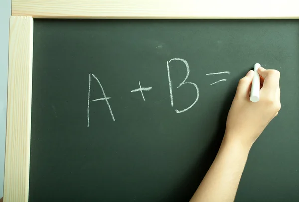 Hand write exercise on the blackboard — Stock Photo, Image