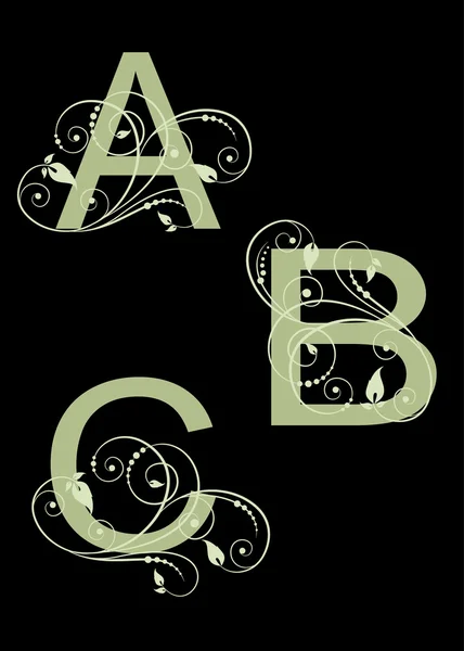 stock vector Letters of alphabet with calligraphic design elements