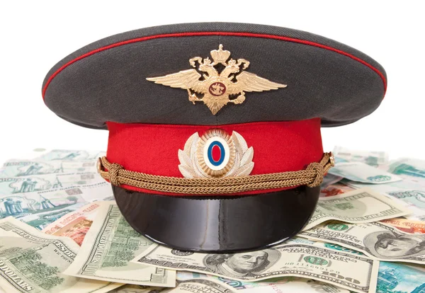 Police cap and money on white background — Stock Photo, Image