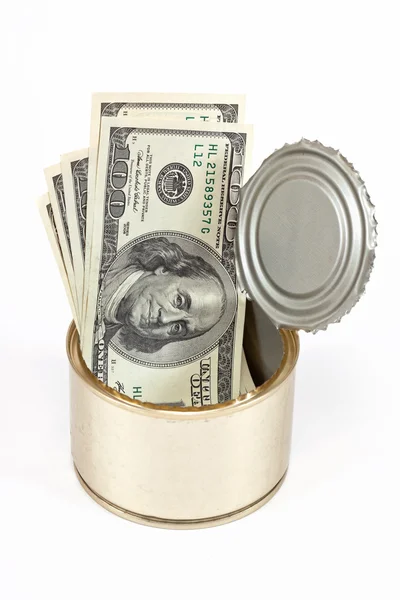 stock image US dollars bills in tin can over white background