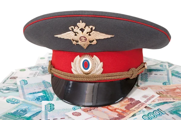 stock image Police cap and money on white background