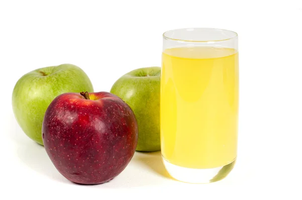 Copo de suco e maçãs — Fotografia de Stock