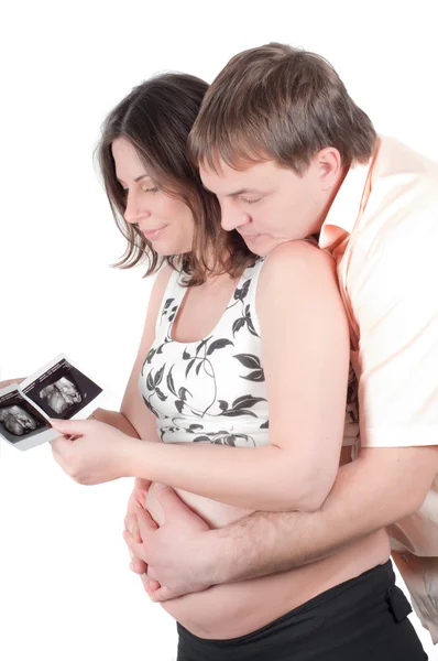 Par hålla ett sonogram av deras barn — Stockfoto