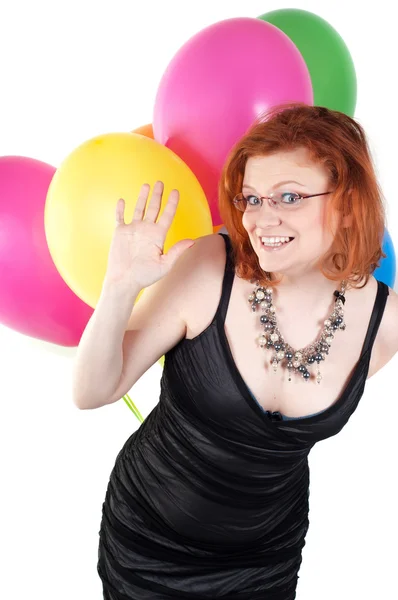 Mooie vrouw met veelkleurige lucht ballonnen — Stockfoto