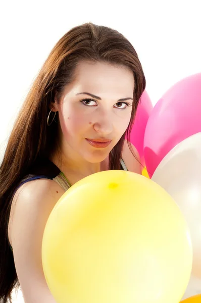 Beautiful woman with multicolored air balloons — Stock Photo, Image
