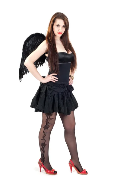 Krásná bruneta žena s černými křídly — Stock fotografie