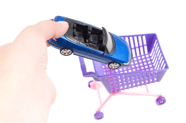 Conceptual photo with car and shopping-cart — Stock Photo, Image