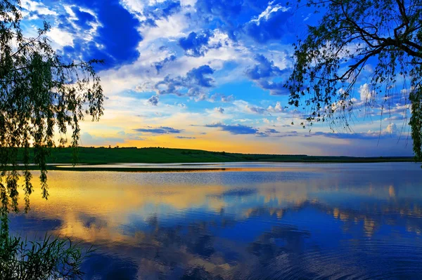 stock image Sunset over lake