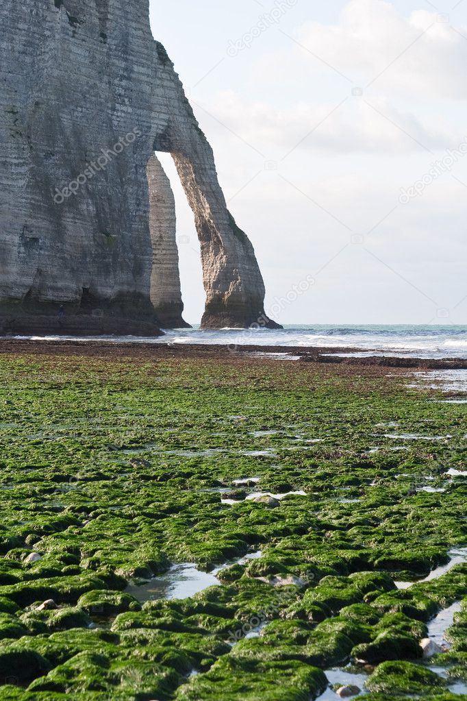 The famous cliffs at Etretat in Normandy, France. Tide sea