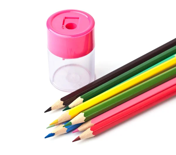 Colored pencils and sharpener — Stock Photo, Image