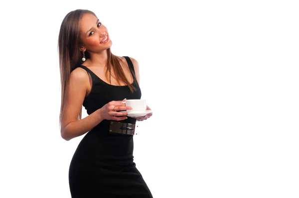 Frau in dunklem Kleid mit Tasse — Stockfoto