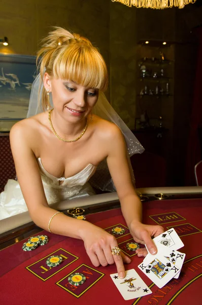 stock image Lovely bride playing cards