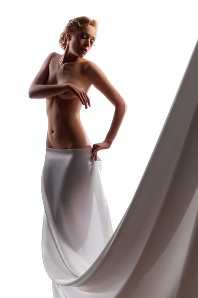 Naken kvinna i en vit mantel — Stockfoto