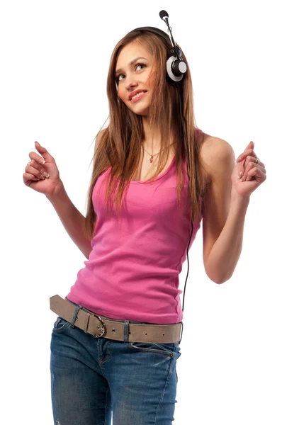 Girl in jeans and headphones — Stock Photo, Image