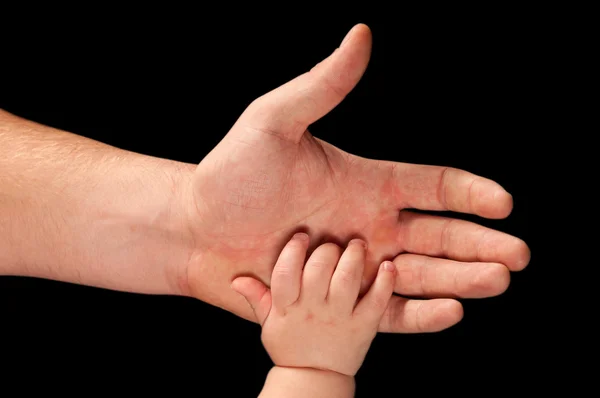 Le mani di padre e figlio — Foto Stock