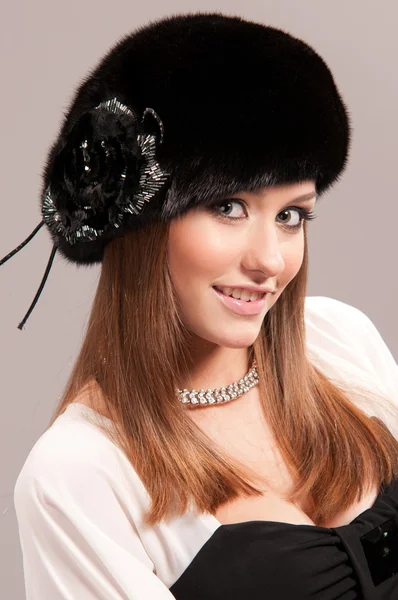 Woman in a fur hat — Stock Photo, Image