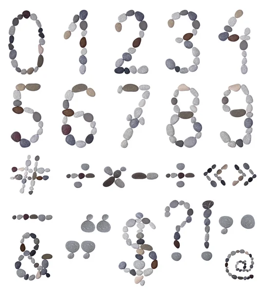 Collection of letters and numbers of sea stones — Stock Photo, Image