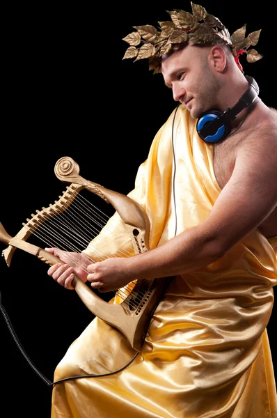 Man with a harp — Stock Photo, Image
